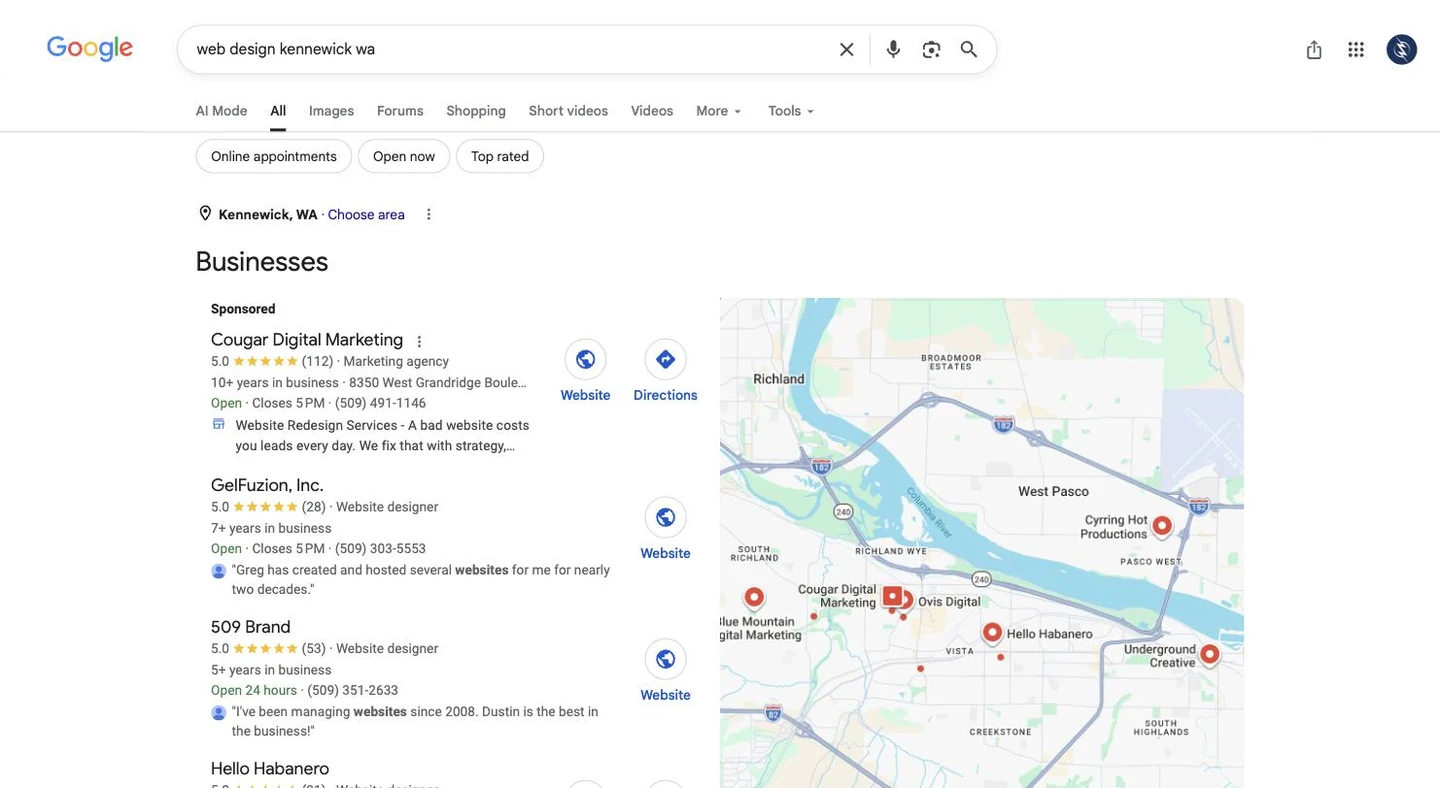Google business results for web design Kennewick with a sponsored agency at the top