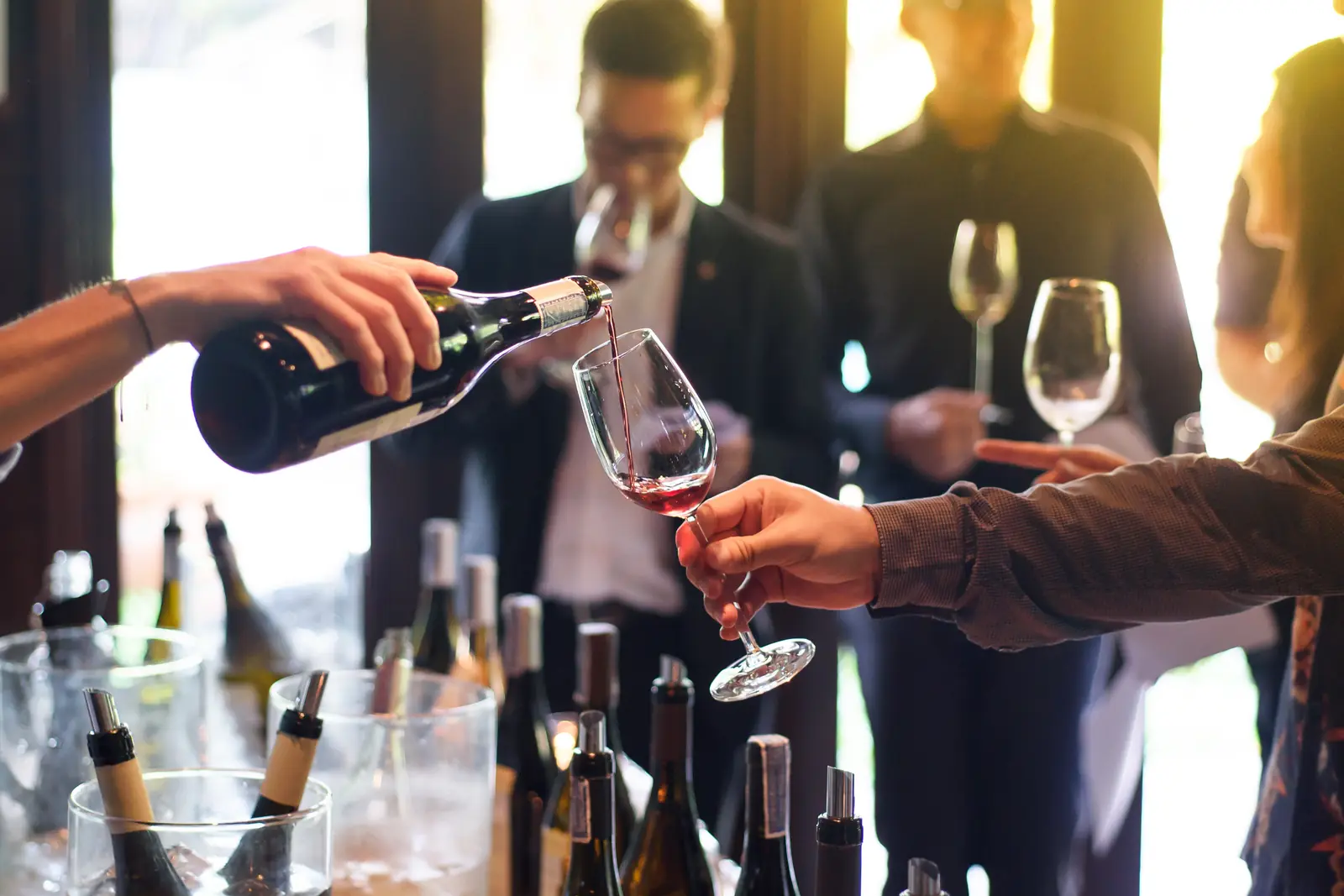 A pour at the tasting bar, the moment a winery website is trying to book